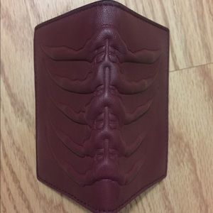 Alexander McQueen oxblood rib cage design bi-fold wallet